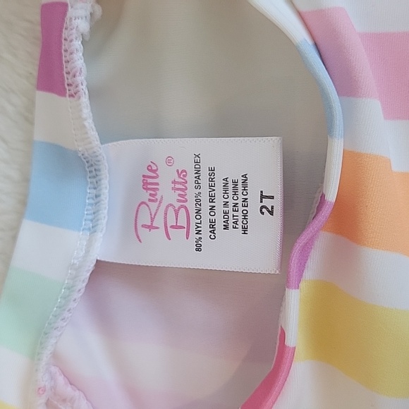 Ruffle Butts Rainbow Dream Short Sleeve Rashguard 2-Piece Swimsuit | 2T - Picture 5 of 6